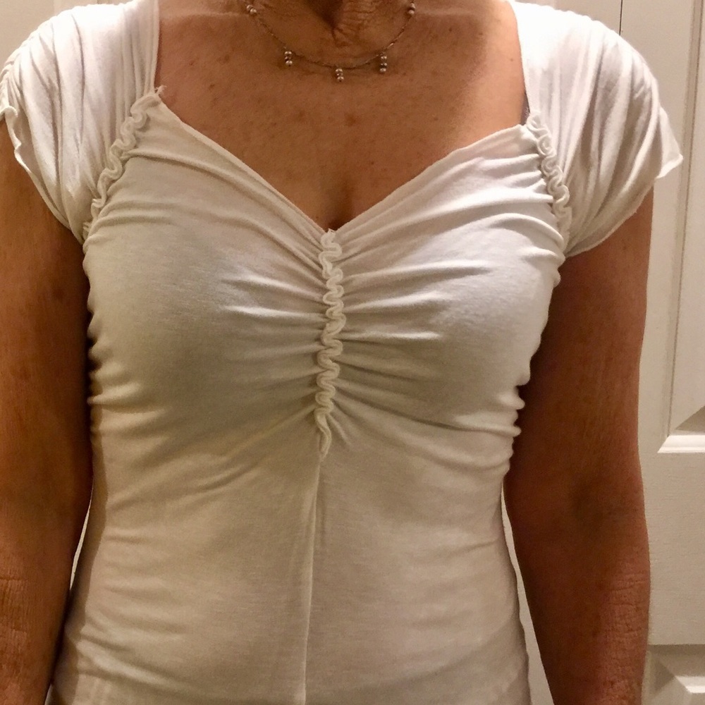 Women’s white v-neck with ruffles short sleeve